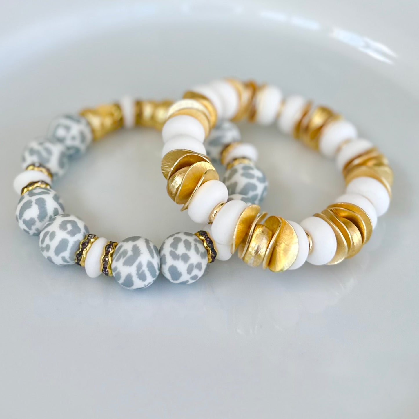 GOLD WAVY DISC AND WHITE BANGLE