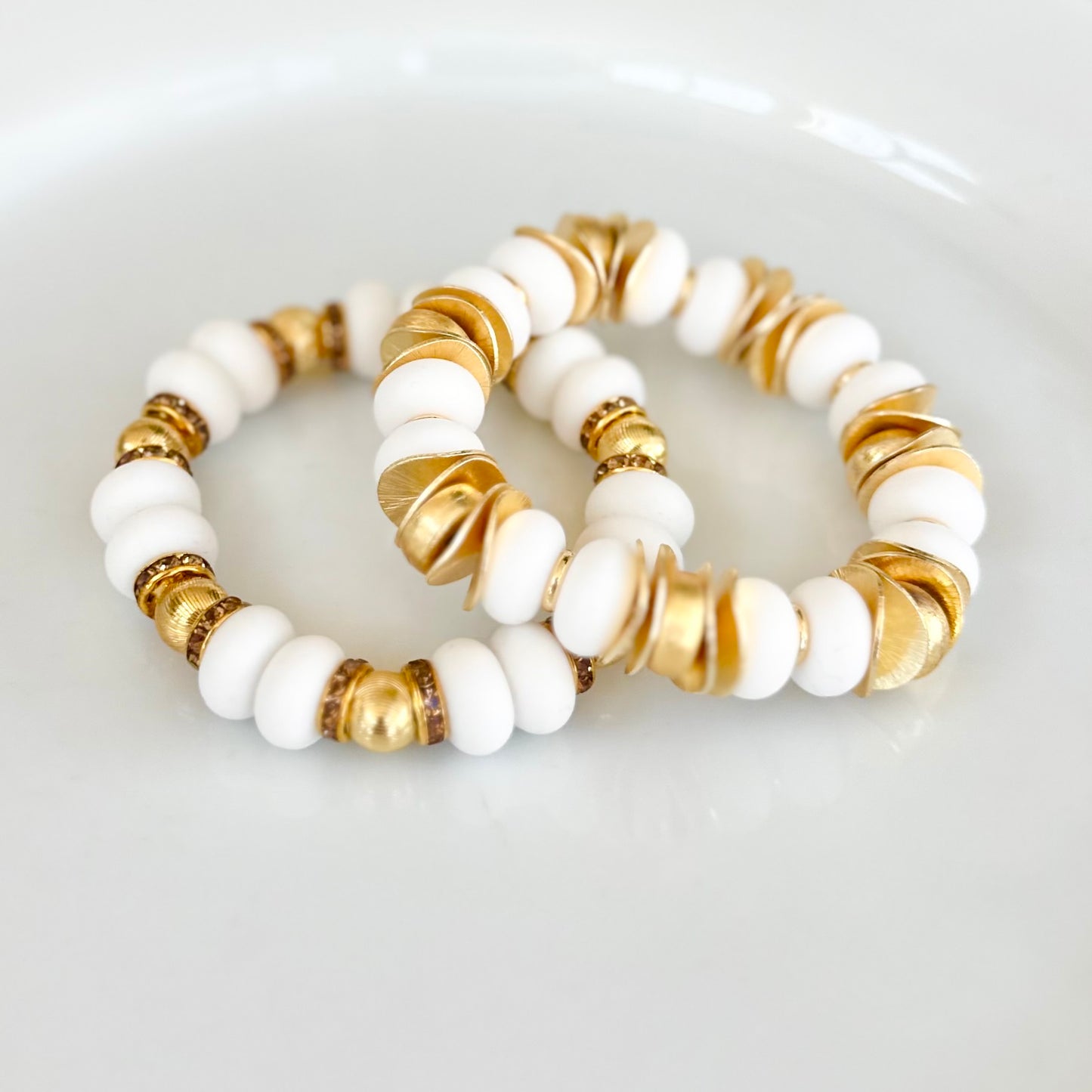 GOLD WAVY DISC AND WHITE BANGLE