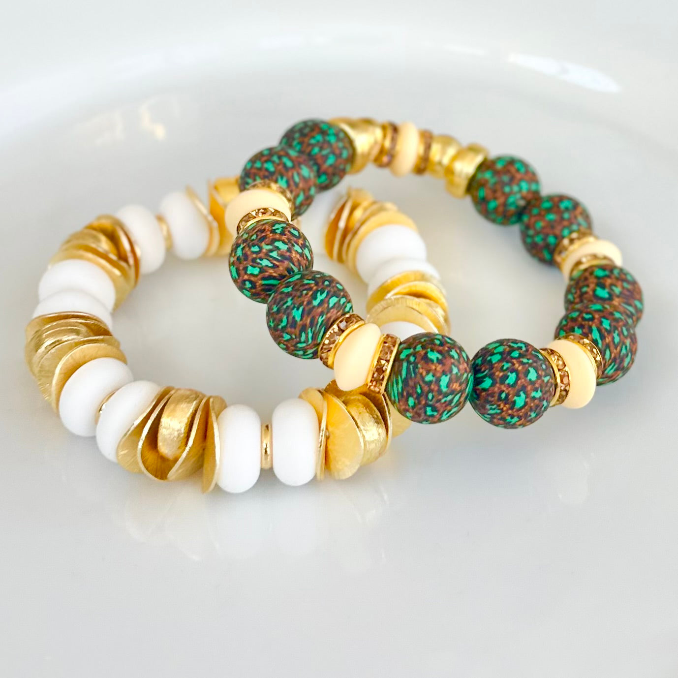 GOLD WAVY DISC AND WHITE BANGLE