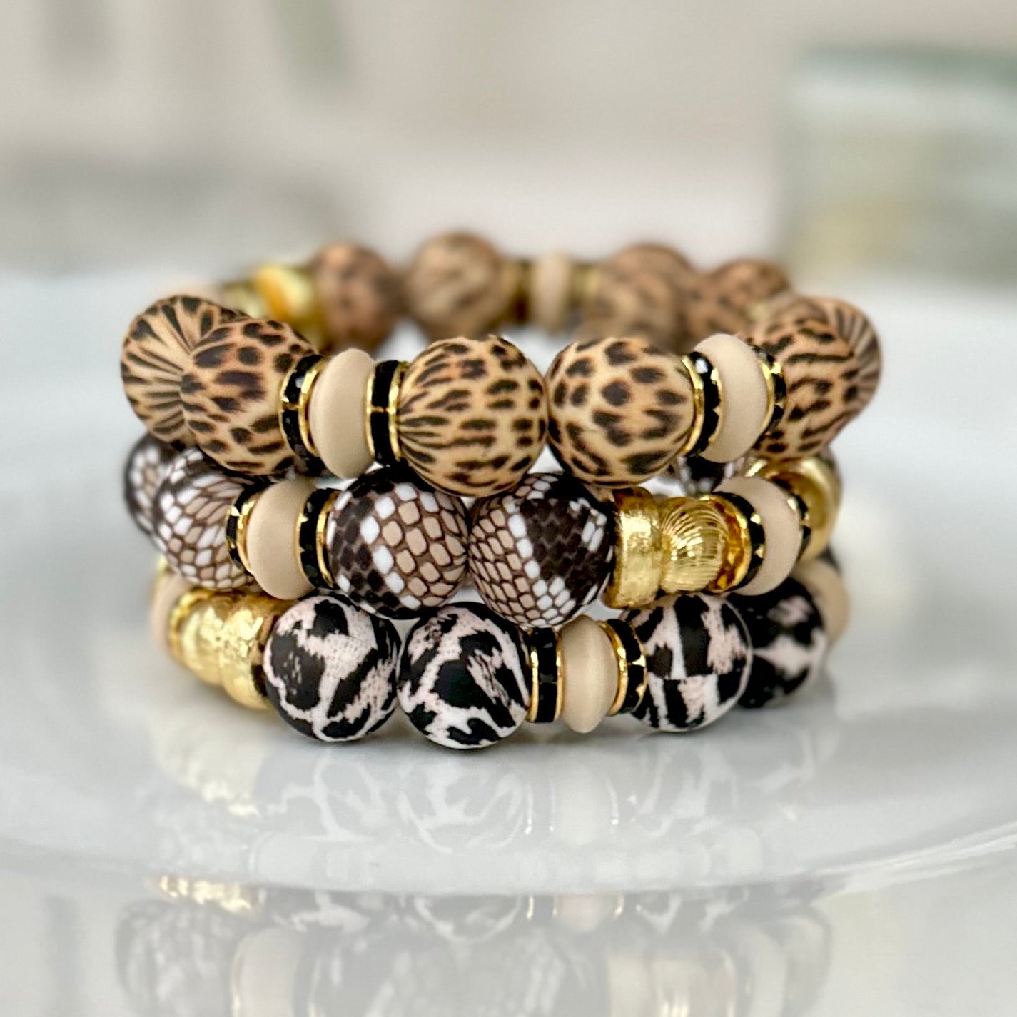 BLACK AND TAN CHEETAH BANGLE WITH GOLD AND CZ ACCENTS