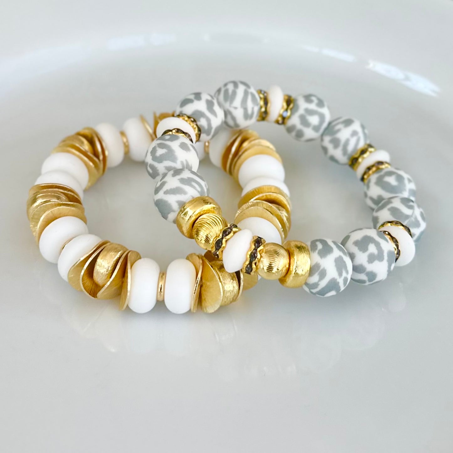 GOLD WAVY DISC AND WHITE BANGLE